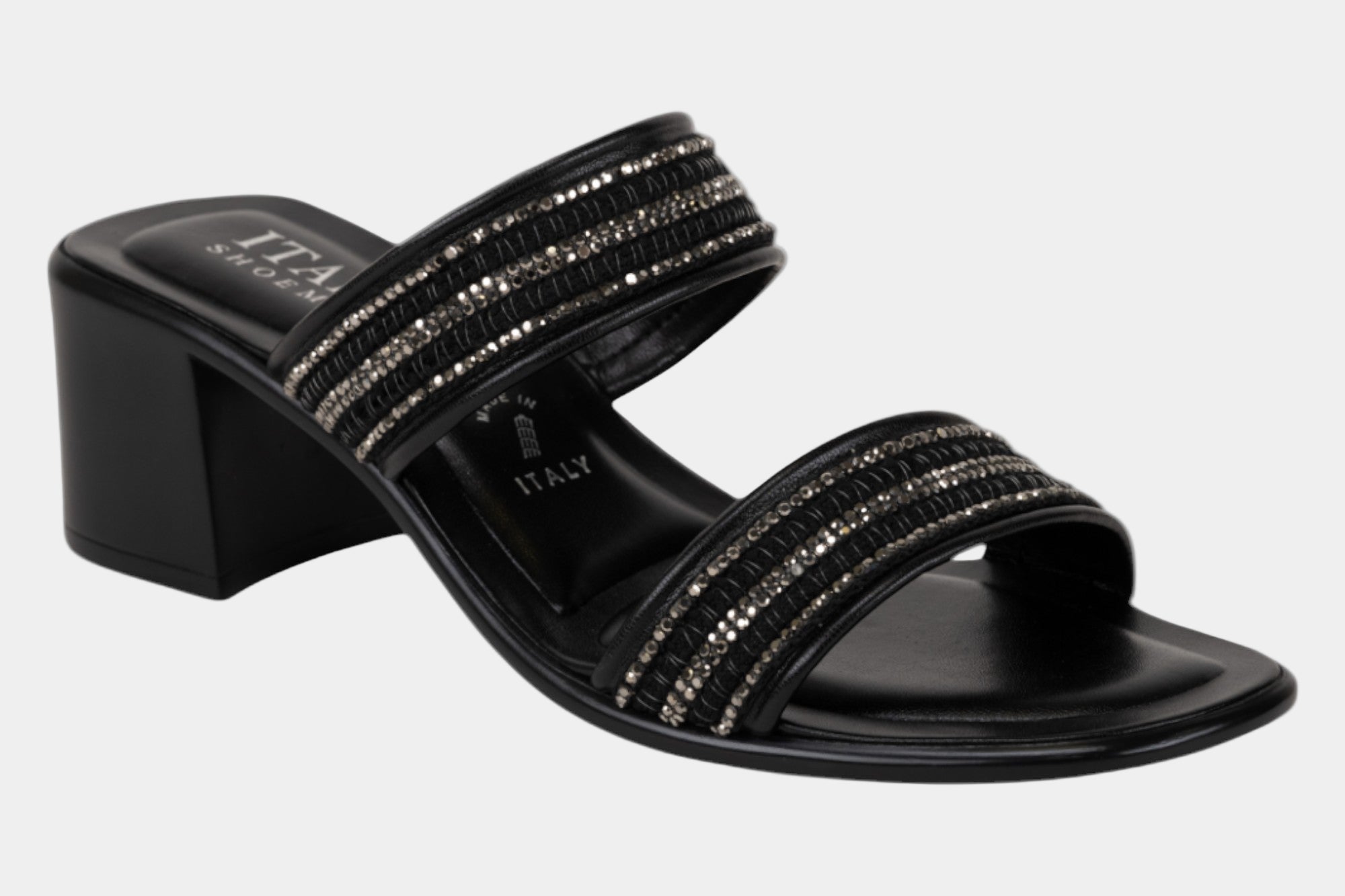 Black sandal with rhinestone embellishments on a white background